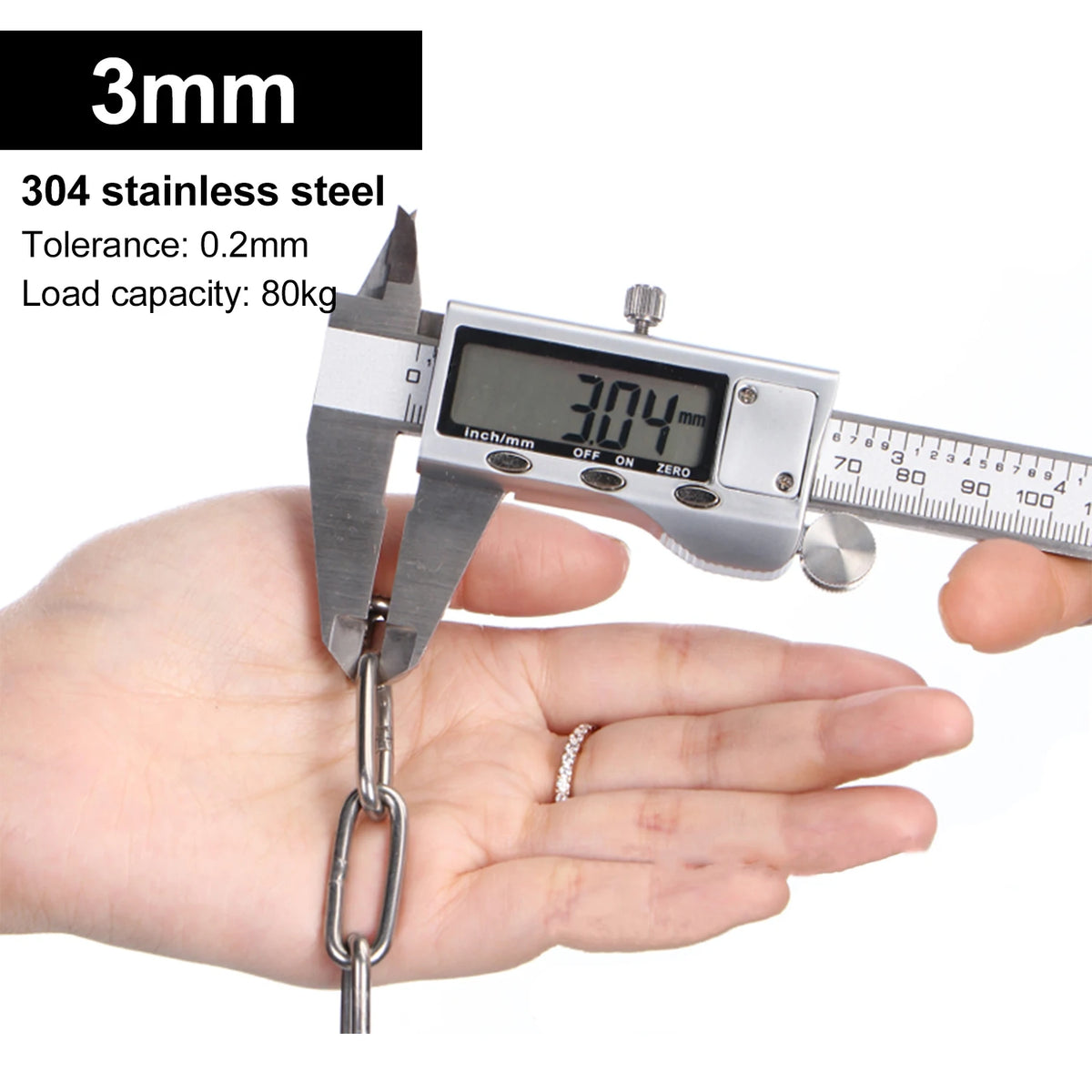 A hand holds a 3mm stainless steel chain and a digital caliper measuring its thickness.