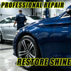A close-up of a blue car body showing professional repair work and a shiny wheel.