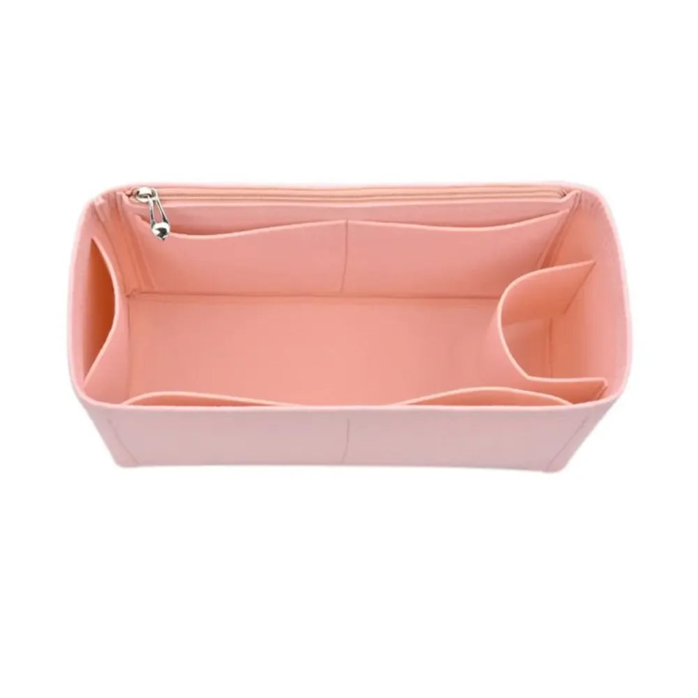 A pink felt insert liner designed to organize and protect handbags.