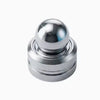 A polished silver metal desk spinner with a smooth, spherical top.