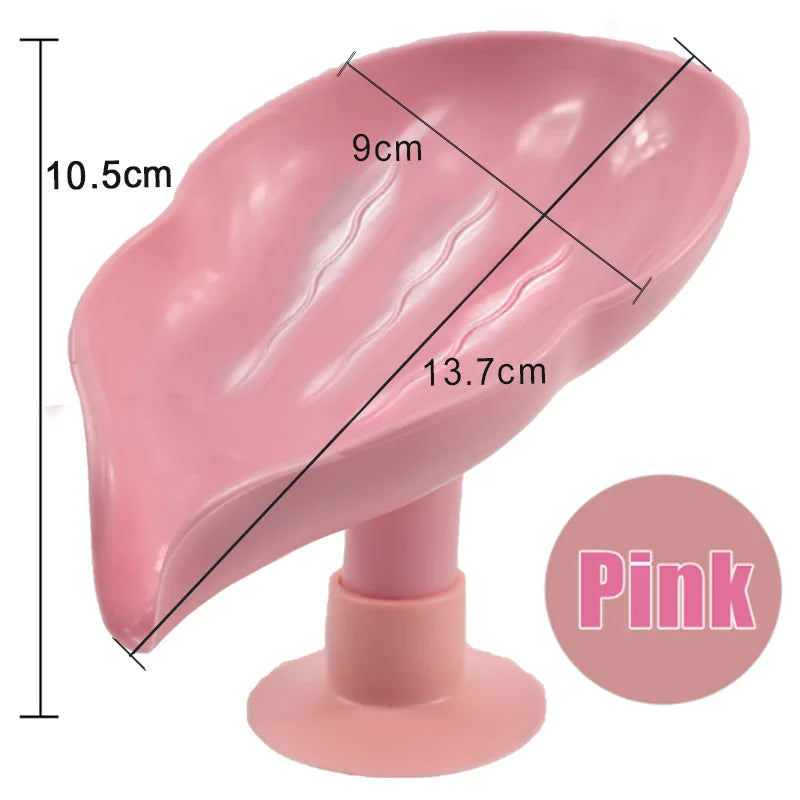 Pink leaf-shaped suction cup soap dish with a self-draining tray