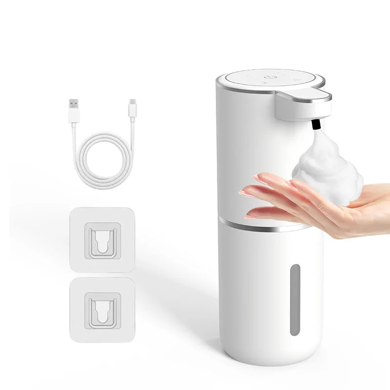 A white touchless automatic soap dispenser with a pump head and four foam control levels is shown next to its components.