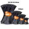 A pile of assorted black nylon cable ties in various lengths, including 4-inch, 6-inch, 8-inch, 10-inch, and 12-inch sizes.