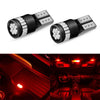 A pair of Canbus Error-Free T10 LED bulbs for replacement, shown in close-up against a car interior background.