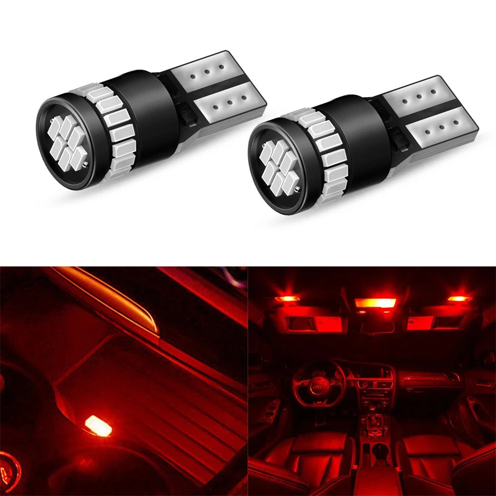 A pair of Canbus Error-Free T10 LED bulbs for replacement, shown in close-up against a car interior background.