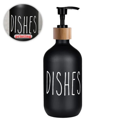 Black refillable soap dispenser bottle with white text reading DISHES printing on the label.