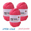 Three skeins of pink peach powder colored milk cotton yarn for knitting and crochet