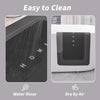 Image showing a floor mat being rinsed with water and another mat drying by air.