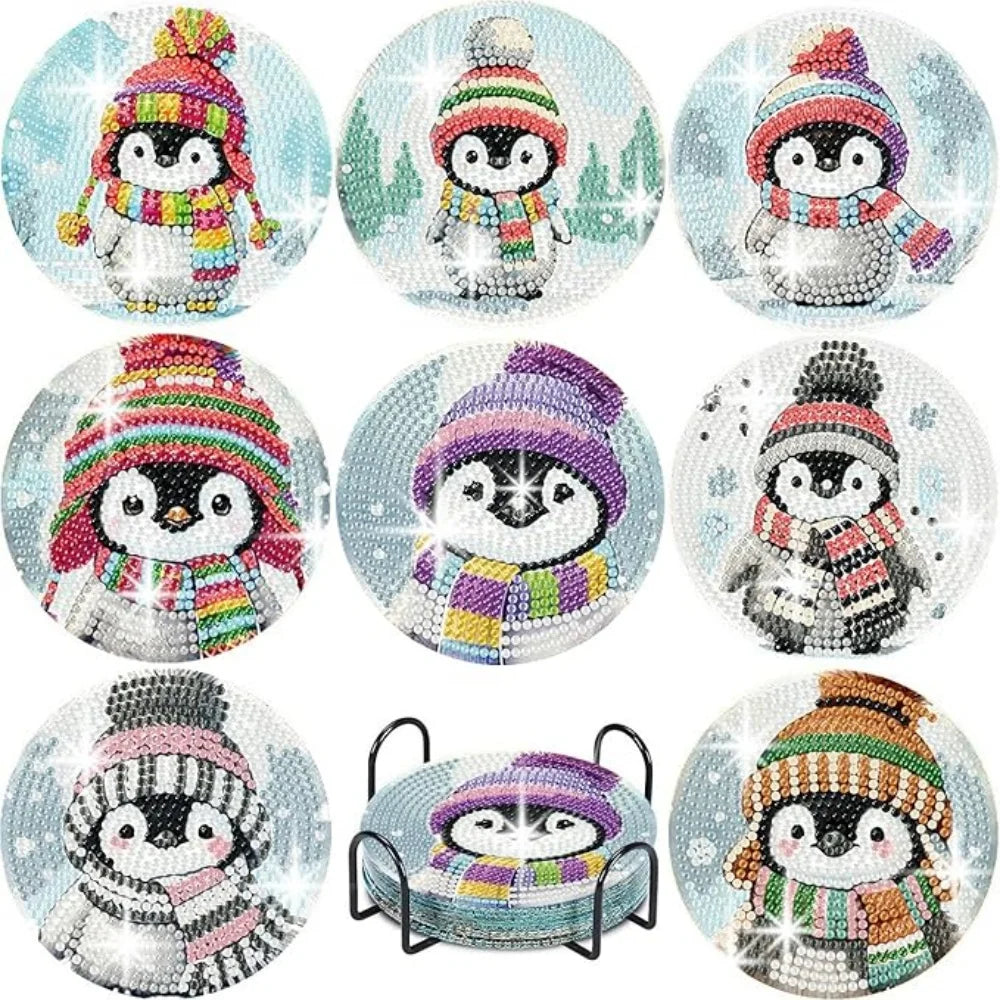 A set of DIY diamond art coasters featuring various penguin designs with metal stands.