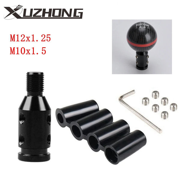 Black gear shift knob adapter with various thread sizes and a set of cylindrical adapters.