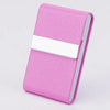 A pink slim card holder with a white metal slide closure.
