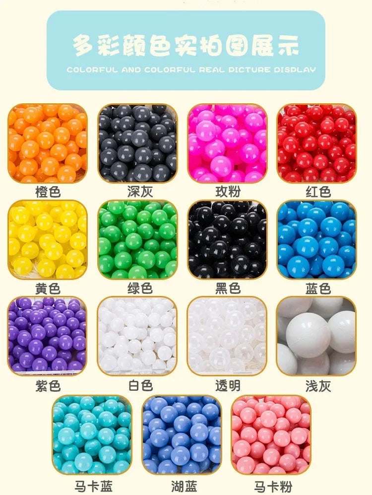 A display of various colorful plastic balls including orange, black, pink, red, yellow, green, blue, purple, white, and trans