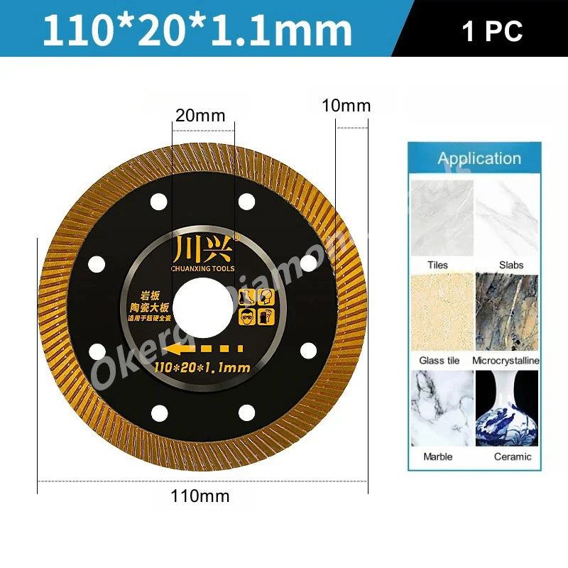 A circular diamond saw blade with a black body and gold edge, designed for cutting tiles, slabs, glass, marble, and ceramic.
