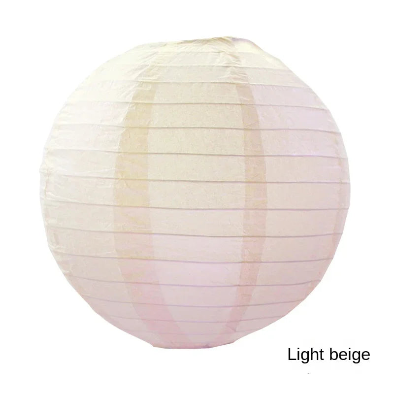 A round paper lantern in light beige with horizontal folds.