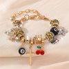 Leopard Cross & Black Beaded Bracelet with Sparkling Crystal Accents