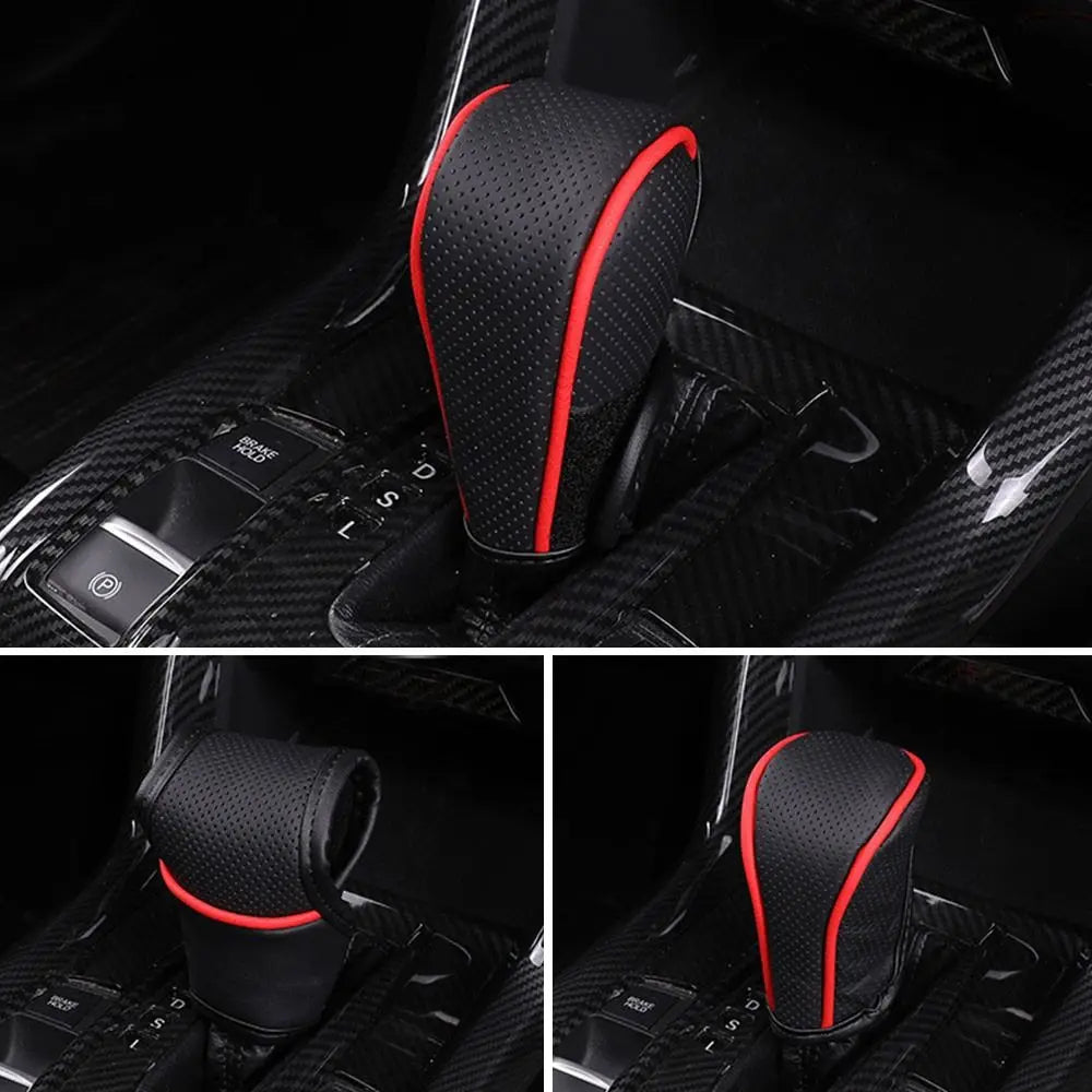 Close-up view of a black leather gear shift knob cover with red accents installed in a vehicle interior.