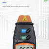 A black digital tachometer measuring 9563 RPM, shown against a white background.