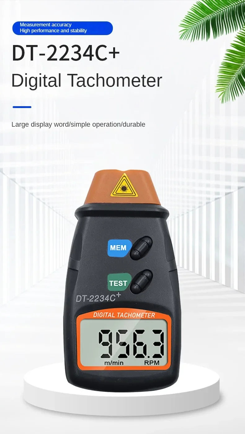 A black digital tachometer measuring 9563 RPM, shown against a white background.