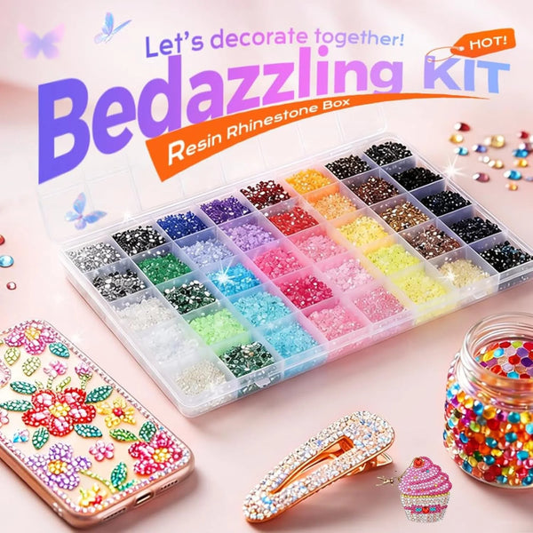 A DIY resin rhinestone kit box filled with various colored flatback gems and accessories, including a phone case and jewelry.