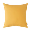 A square, mustard yellow linen-textured cushion cover or pillow.