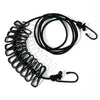 Black elastic travel clothesline with non-slip clips coiled and laid out.