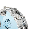 A close-up of a silver self-tuning tambourine with double rows of stainless steel jingles.