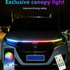 An RGB LED canopy light strip installed on a car hood, with a smartphone and remote control nearby.
