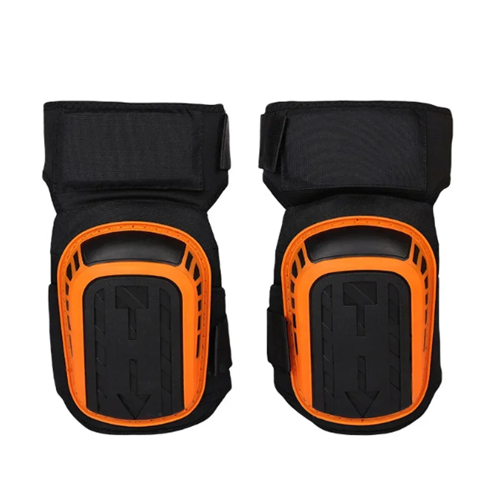 A pair of black heavy-duty gel knee pads with orange accents and adjustable straps.