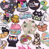 A collection of cartoon cat embroidery patches featuring various cats in different styles and colors.