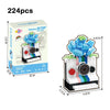 A set of 224 pieces of retro camera and flower bonsai building blocks for DIY decor.