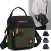 A dark green and black backpack featuring multiple compartments and an adjustable strap.