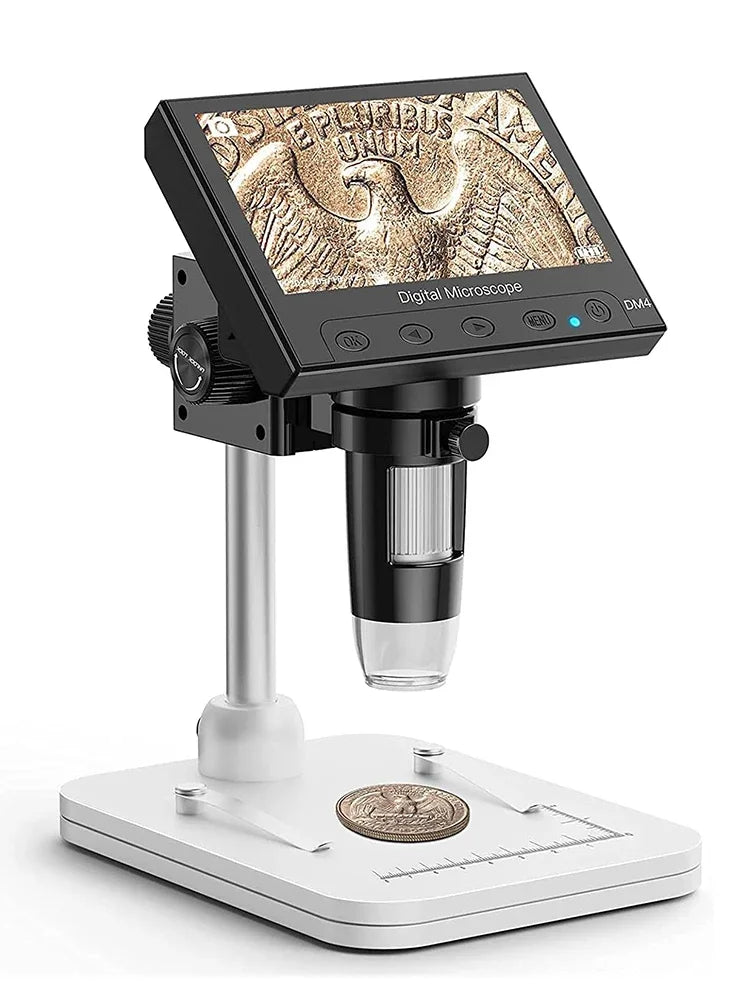 A black digital microscope with an LCD screen is mounted on a white base for detailed inspection and soldering.