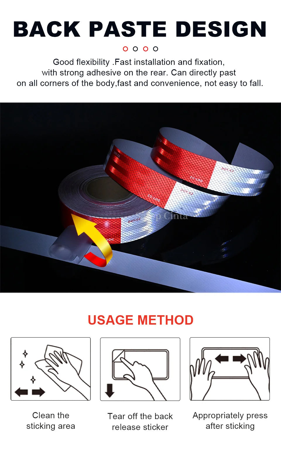 Roll of red and white reflective safety tape being used for vehicle decoration or marking.