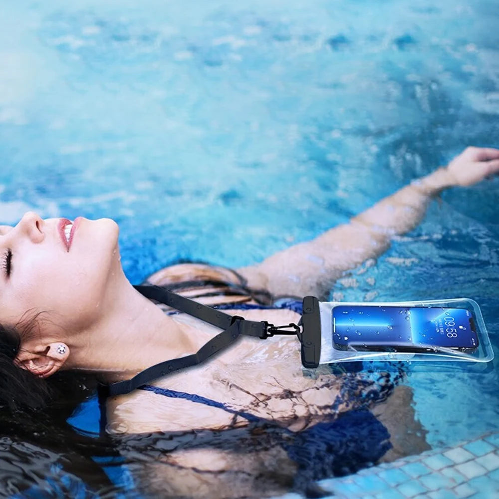 A woman floating in blue water wearing a universal waterproof phone pouch with a lanyard.
