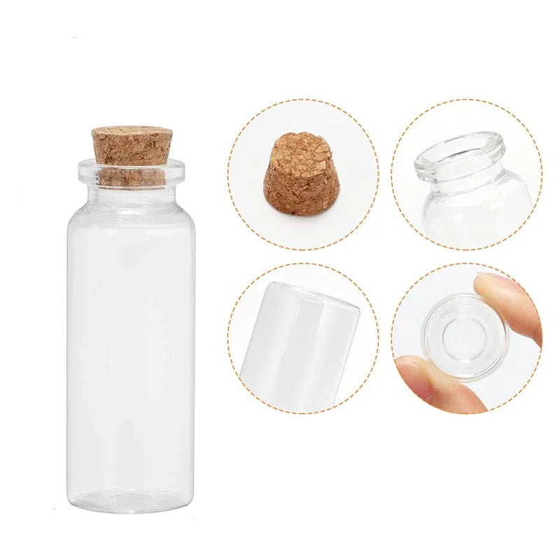 Clear glass bottle with a cork stopper and various glass components shown in detail.