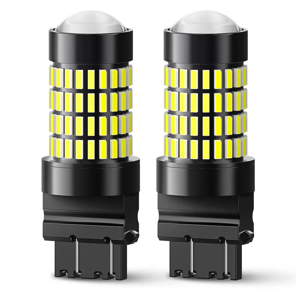 A pair of T25 3157 LED bulbs for brake lights or turn signals, featuring bright yellow light inside black casings.