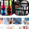 A complete sewing kit showing various tools including seam ripper, safety pins, tape measure, needle, magnifying glass, and s