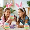 Two girls holding a set of six articulated mini dragon eggs for Easter and decor