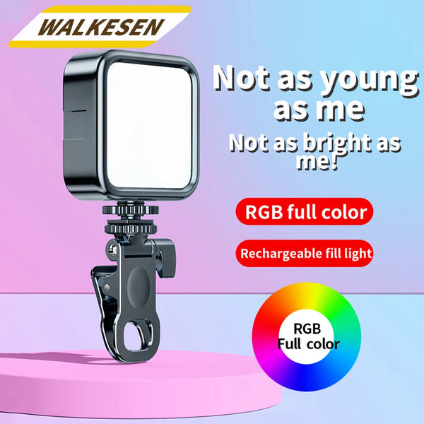 Luz LED portátil tipo clip con panel cuadrado y luz RGB recargable de color.