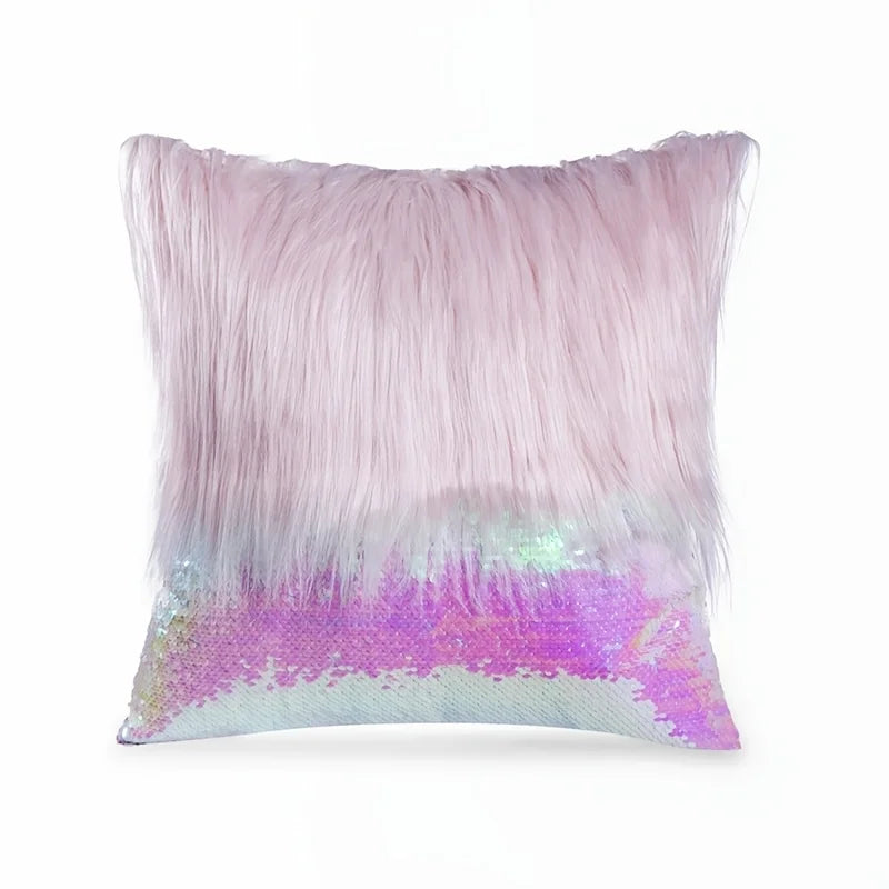 A decorative pillowcase featuring a soft pink fur top and a shimmering silver and gold sequin bottom.