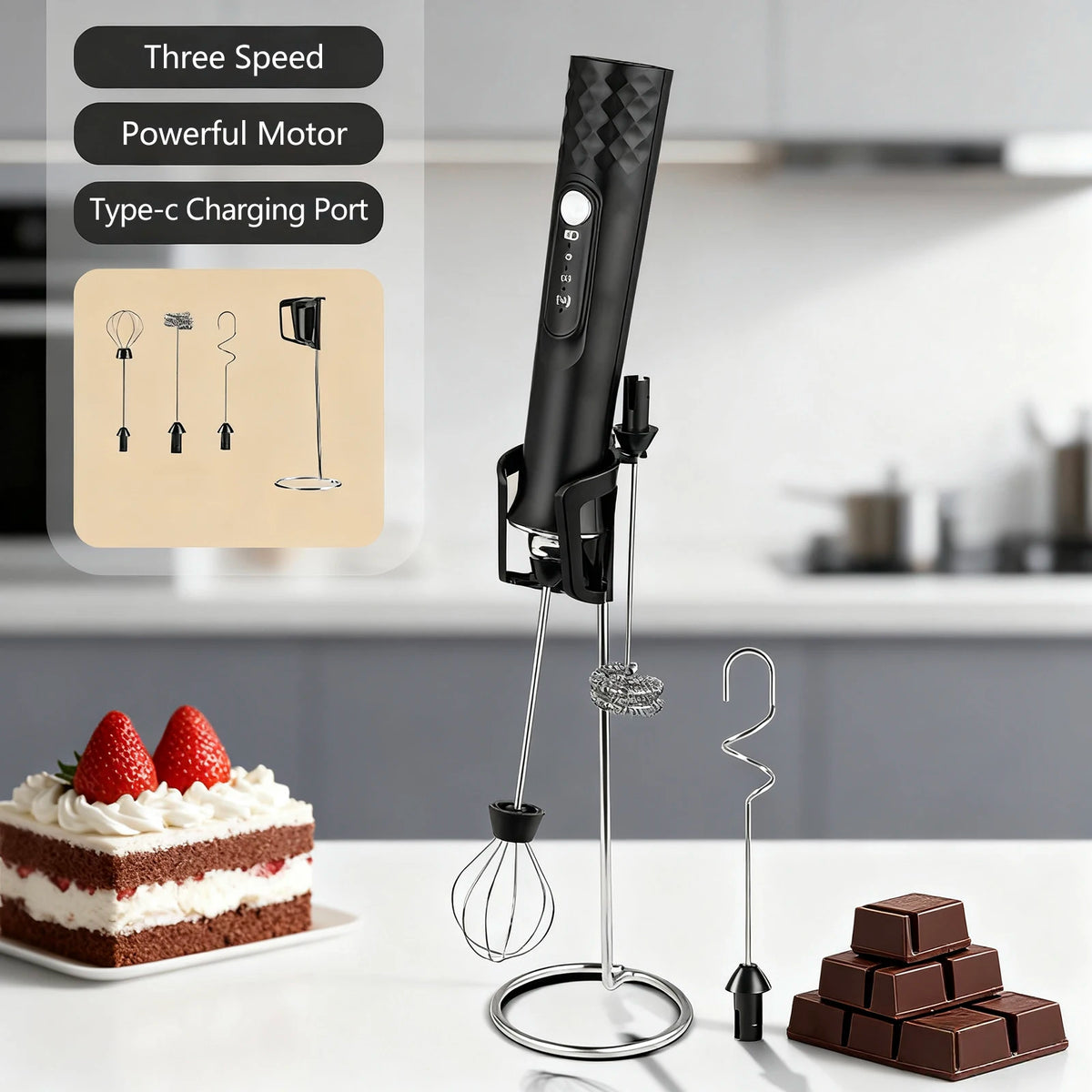 A black rechargeable handheld milk frother with a stainless steel whisk attachment is shown next to ingredients and chocolate