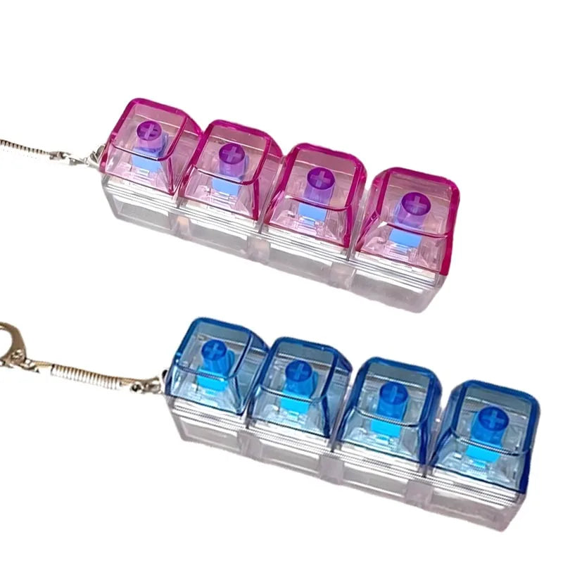 A set of pink and blue LED light-up keyboard fidget toys attached to a keychain.