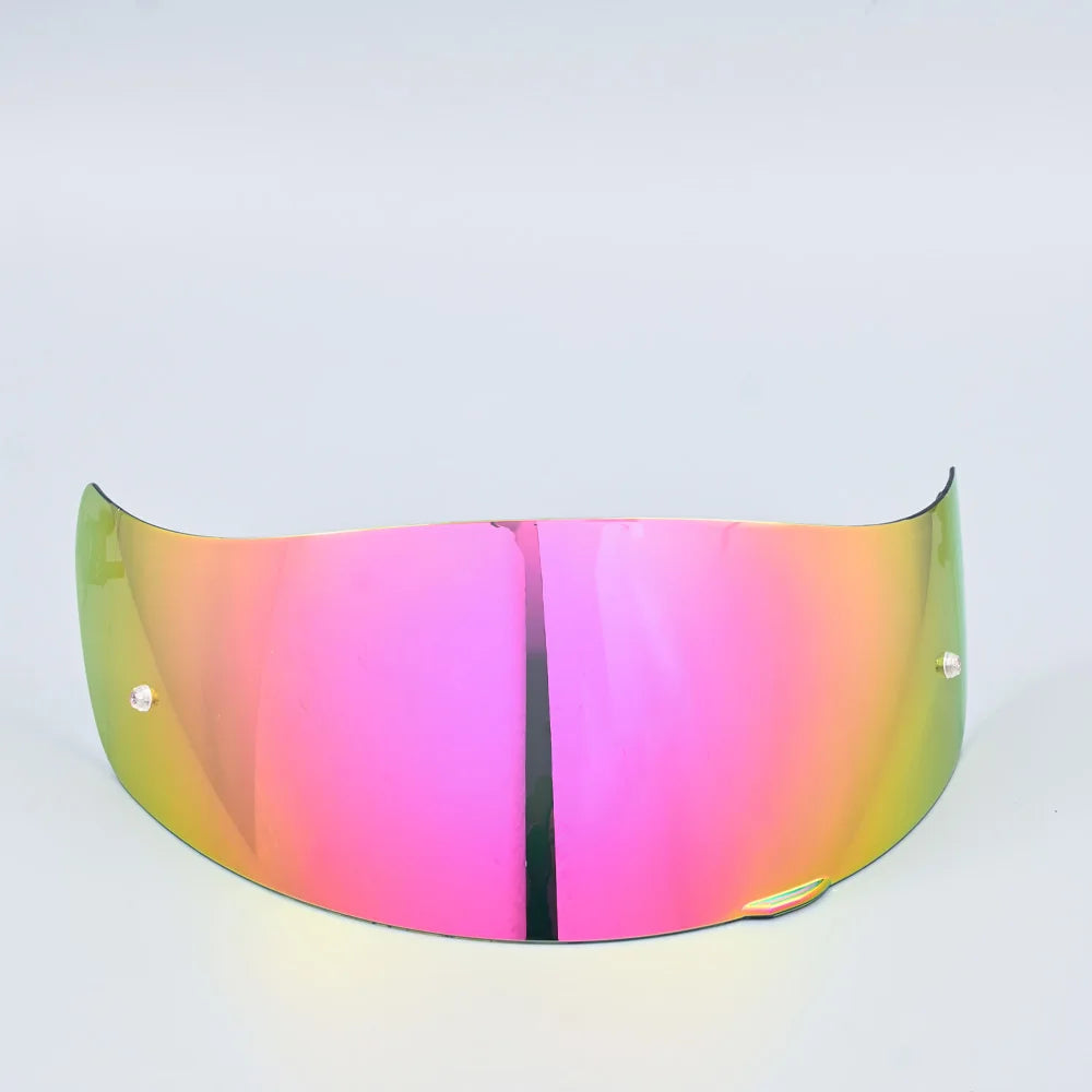 A motorcycle helmet visor lens shield with a gradient pink and green tint.