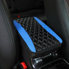 Black and blue quilted PU car armrest cover with a storage pad inside a vehicle interior.