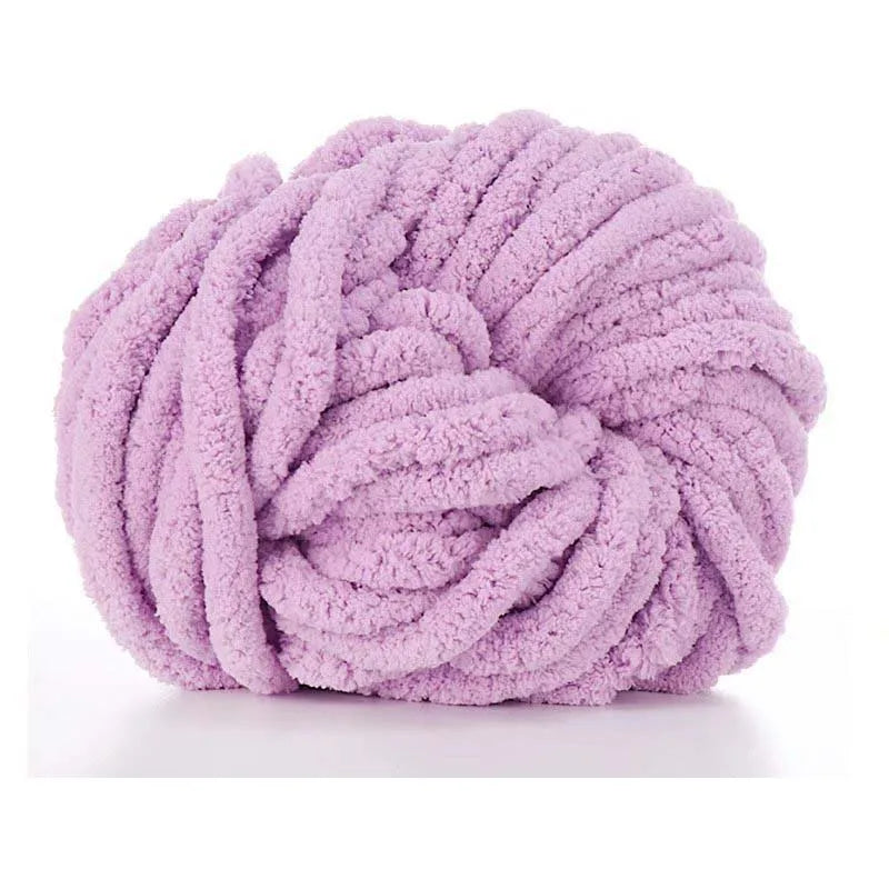 A ball of fluffy lavender chunky acrylic yarn for knitting and crochet