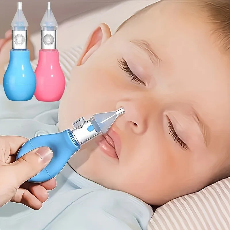 A hand holds a blue nasal aspirator device with a silicone tip near a baby's nose.
