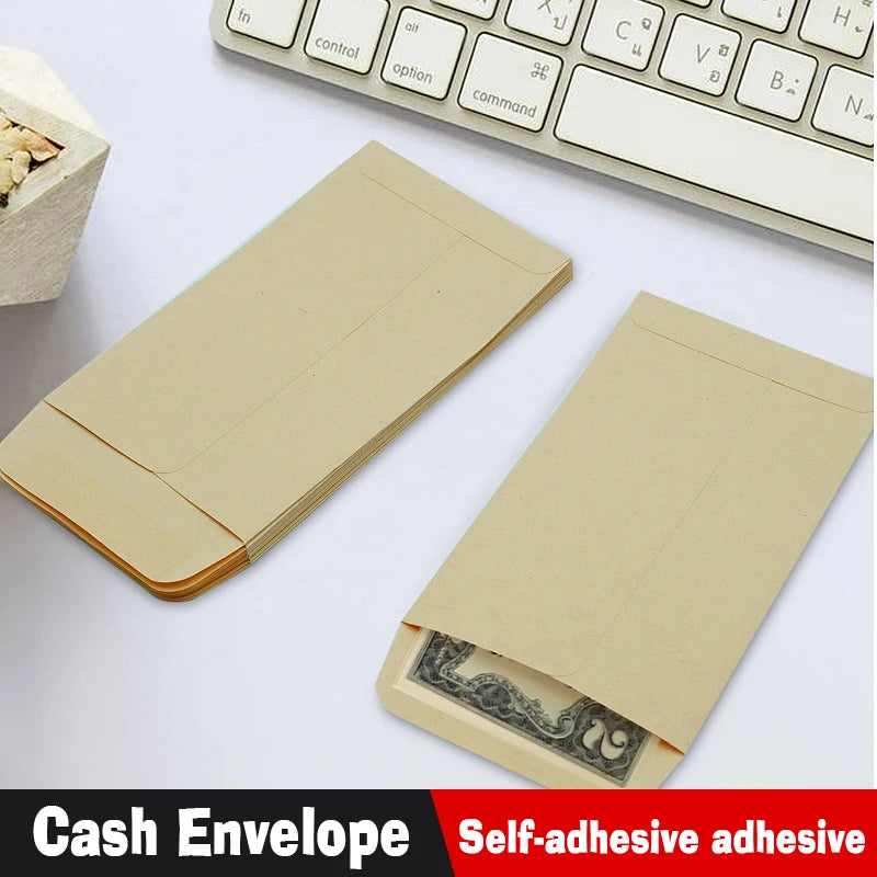 A set of kraft paper cash envelopes is shown next to a keyboard, demonstrating self-adhesive money storage and gift giving.