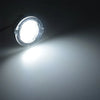 A bright LED puddle light mounted on a side mirror, illuminating the ground below.