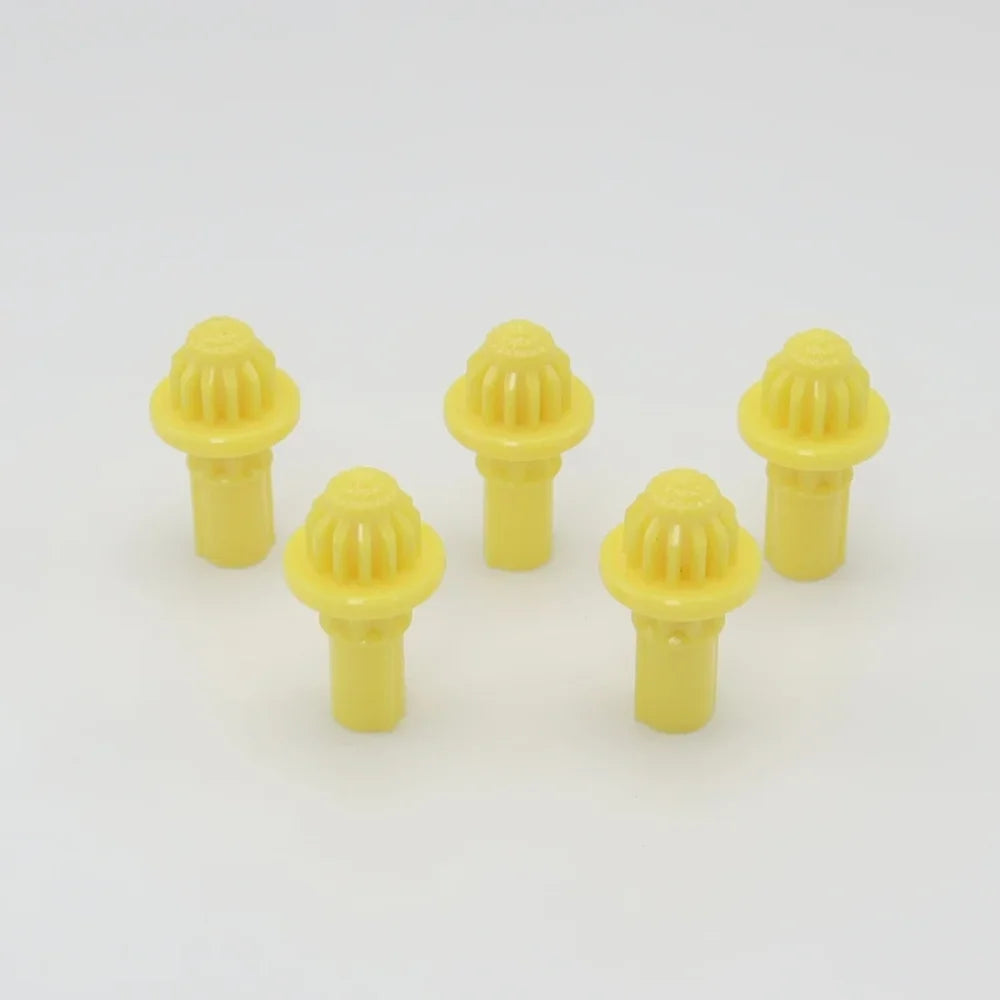 A set of five yellow replacement drivers for a Takara Tomy battling top, displayed against a white background.