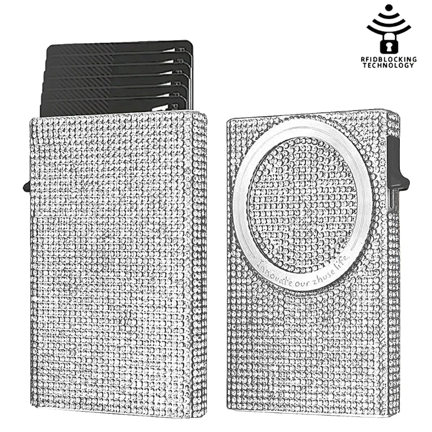 A slim aluminum pop-up card wallet with a textured surface shown in a vertical orientation.